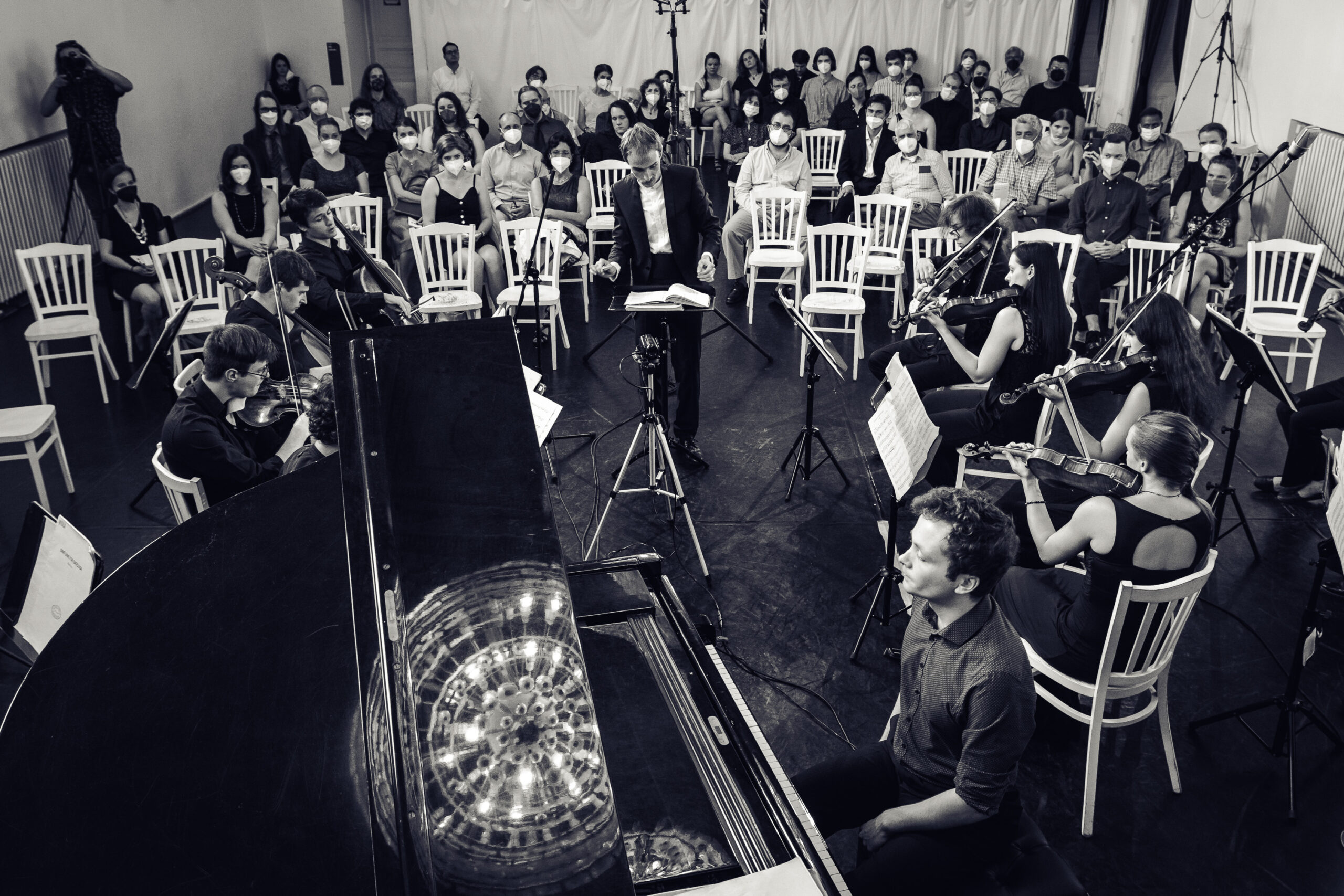 Adam Dvořáček at the piano - performs with orchestra