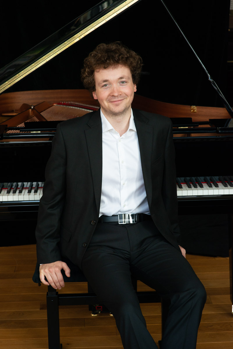 Adam Dvořáček at the piano - artist portrait